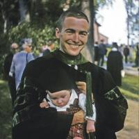 Holding his two month old son, Dr. Donald Bicknell celebrates his graduation from the University of Vermont College of Medicine and his entrance into the field he called his chosen profession for fifty years.