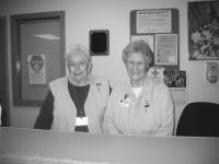 Porter Volunteers Lois Ann Skillings and Fran Ellmore pleasantly greet the public. 