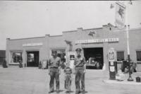 Standing between the two original owners of Person & Foster Motors, six year old Ed Foster stands in front of what today is Foster Motors and represents over forty years of his life’s work.