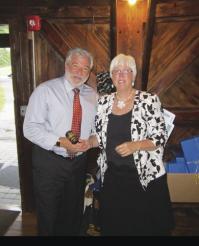 Incoming Rotary President Tony Panella thanks out going Rotary president Sue Burdick