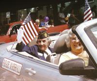 Serving as the Grand Marshall of the Memorial Day Parade, May Fay flashes that famed smile and shows a nation that she is still very proud of her military service and still does volunteer and serve..