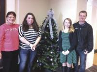 Pausing by the trees are teacher Pamela Taylor, Cassi King, Kimberly Eno and Nathan Unger.