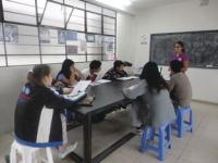 Nydelis shown teaching a youth entrepreneurship and business plan writing course to a group of secondary school (the Peruvian equivalent of high school) graduates studying at the technical institute.