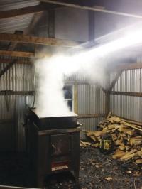 Boiling in the sugar shack is in its fourth year as a business for Brad. He plans on expanding his Addison business after high school.