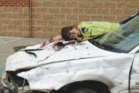 A student acting in the Mock Car Crash.