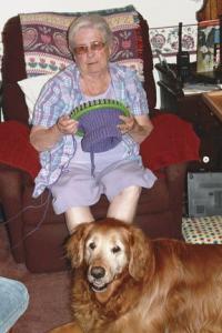 Making hats for others with her trusty pup at her side is just one way Lois measures happiness.