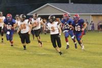 Speedy Bobby Ritter heads down field against three Hartford defenders.
