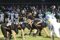 #55 Ploof, #56 Wright and #54 Laberge lineman for Midd Tigers