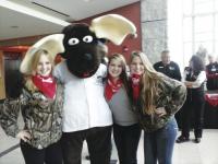 With her sisters and the Fletcher Allen Mascot, Danielle is raising funds and awareness.