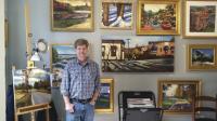 Vermont artist Sean Dye stands by just some of his work that is on display and for sale at the Vergennes location.  Dye also reaches classes at the Creative Space Gallery and Sean Dye Studio.