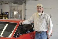 Above: Jim Ryan finishes up the body and paint work on a beautifully prepared Mustang at his auto body shop on the Whiting/Shoreham road.  Jim will be trading his shop clothes for his fire suit when he buckles up in the #60 car for the 2015 racing season at Devils Bowl Speedway in West Haven Vt. On May 9th..  Jim and his crew look forward to joining the fray on both dirt and asphalt after a five year hiatus from the sport.