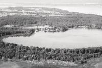 This aerial photo by Robert Lyons was a favorite of Wally as it shows the home he and Betty built with family and love. It also shows Lake Champlain and the environment which was a passion for Wally and a life long project to create technology that would help people manage their use of the the land and the water.