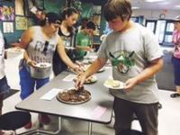 Friday's Foodaroo: Students baked and offered critique of other teams' food products.