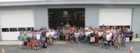 Realizing that they are all a part of Ferrisburgh history, the townspeople assembled today posed for a photo after the ribbon cutting ceremony on the new Town Road & Maintenance Building.