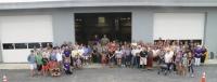 Realizing that they are all a part of Ferrisburgh history, the townspeople assembled today posed for a photo after the ribbon cutting ceremony on the new Town Road & Maintenance Building.                                 