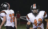 Tigers Junior Trey Kaufmann #43 scores one of his three 4th quarter touchdowns to lead Middlebury to an 18-14 come from behind win over colchester. #72 Junior Pat Messenger provided blocking on the play