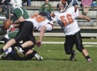 Tigers #88 Larocque and #56 Bruce Wright, strip the ball from Rice quarterback, Jack Fitzgerald during first quarter action at Rice.