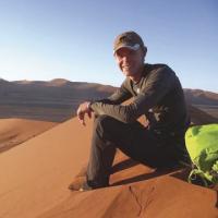 Sitting a top of one of the many dunes he hiked, Addison County's Nathan North's journey across parts of Africa after college graduation opened not only his eyes, but sparked the imagination of teens following him on the Internet.