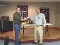 Pictured above Vergennes Lions Club Vice President Jim McClay presents a check for $750 to Bennington Lion Brian Steckley who also is chairperson of the Green Mountain Lions Camp.  