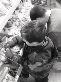 John and son, Sam, delivering cookies.
