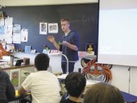 Jack Nop explains the process of making stop-motion videos to 8th graders at MUMS. Other pics: Jack Nop, the local, 16-year-old winner of an International Lego Video Contest, highlights aspects of his video 