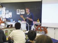 Jack Nop explains the process of making stop-motion videos to 8th graders at MUMS. Other pics: Jack Nop, the local, 16-year-old winner of an International Lego Video Contest, highlights aspects of his video