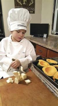 Cutting carefully and following  safe kitchen guidelines is important to Chef Carter.