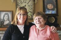 Gloria Vigario Clovell and her daughter Maggie pause to share a smile and many memories of the strength of family.