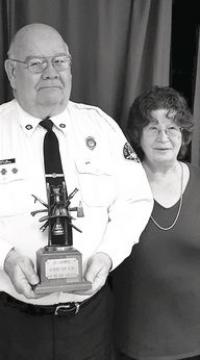 VFD Firefighter Les Champine celebrates 50 years of service.