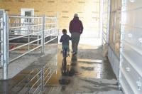 Father & son looking to the future of robotic milking.