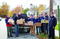Members of the Bristol Fire Department help to deliver the donations to the Have-A-Heart Food Shelf.