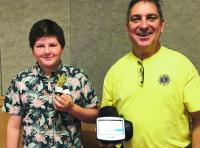 4,000th child screened, Jacob Medici, Williston Central School with Randy Bigelow from the Middlebury Lions Club.
