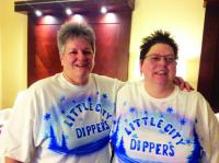 Plunging Tradition continues for Little City Dippers Sarah Leach and Lissa Gebo.
