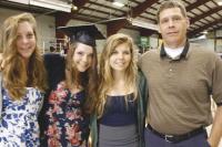 LtoR  Kelsey, Connar (MHUS Class of 2011), Briann and their Dad Paul Foley take a moment for a family graduation photo with The Voice.  Shortly after Connar joined her fellow classmates for “Pomp and Circumstance” and the 2011 Commencement for Middlebury Union High School at the Memorial Sports Center in Middlebury.