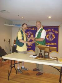 President Tim Cowan handing over the gavel to incoming President Chuck Burkins.